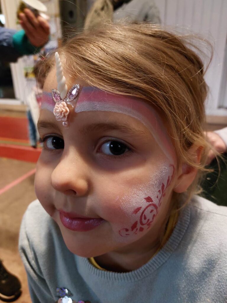 Kindergrime bloem op wangen design